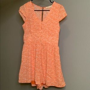 NWOT orange cream romper